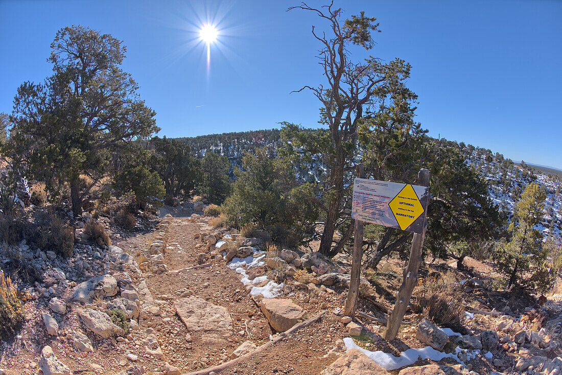 A warning sign at the start of the Hermit Canyon Trail stating that getting to the bottom is optional, but getting back to the top is mandatory, Grand Canyon, Arizona, United States of America, North America