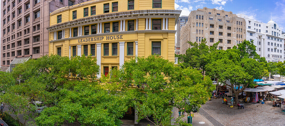 Elevated view of trees, buildings and souvenir stalls on Greenmarket Square, Cape Town, Western Cape, South Africa, Africa