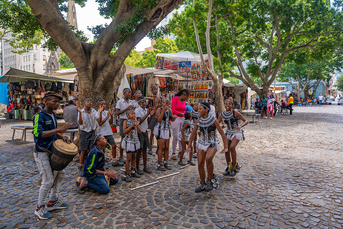 View of traditional song and dance performers in Greenmarket Square, Cape Town, Western Cape, South Africa, Africa