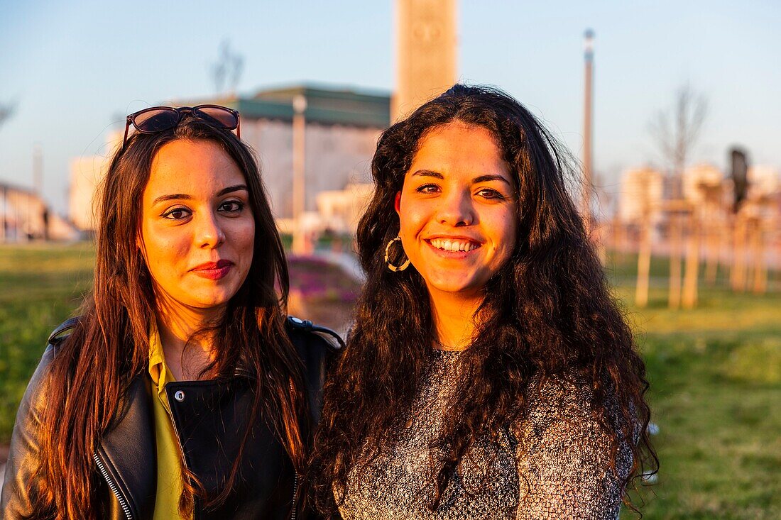 Morocco, Casablanca, young women on the forecourt of the Hassan II mosque