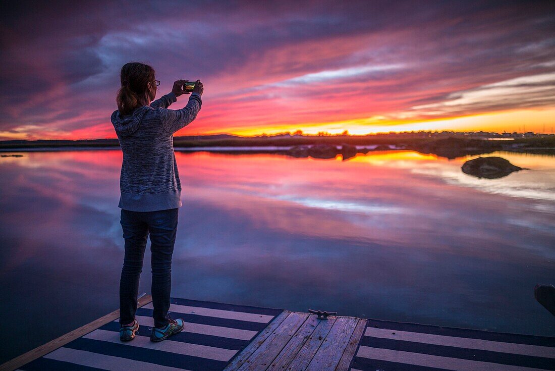 United States, New England, Massachusetts, Cape Ann, Gloucester, Annisquam Harbor, sunset with photographer