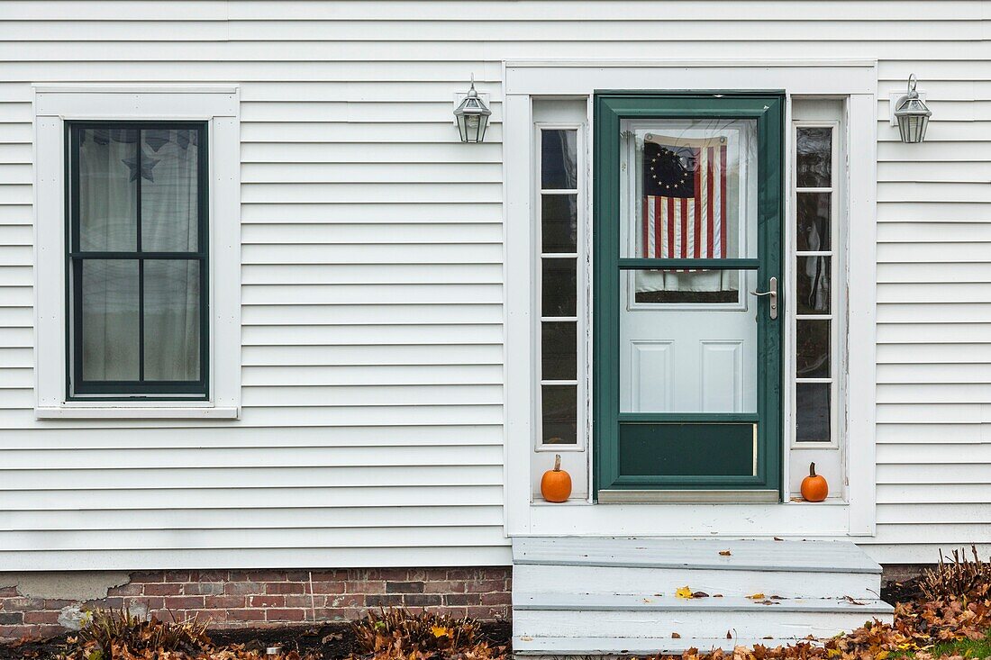 United States, Maine, Wiscasset, house detail with US flag, autumn