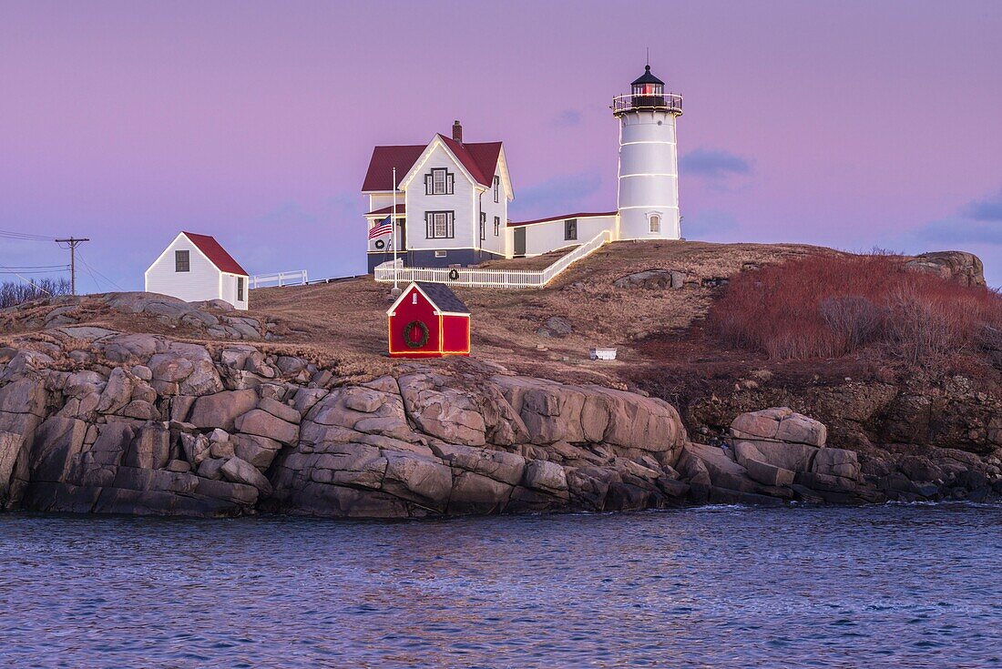 United States, Maine, York Beach, Nubble Light lighthouse, dusk