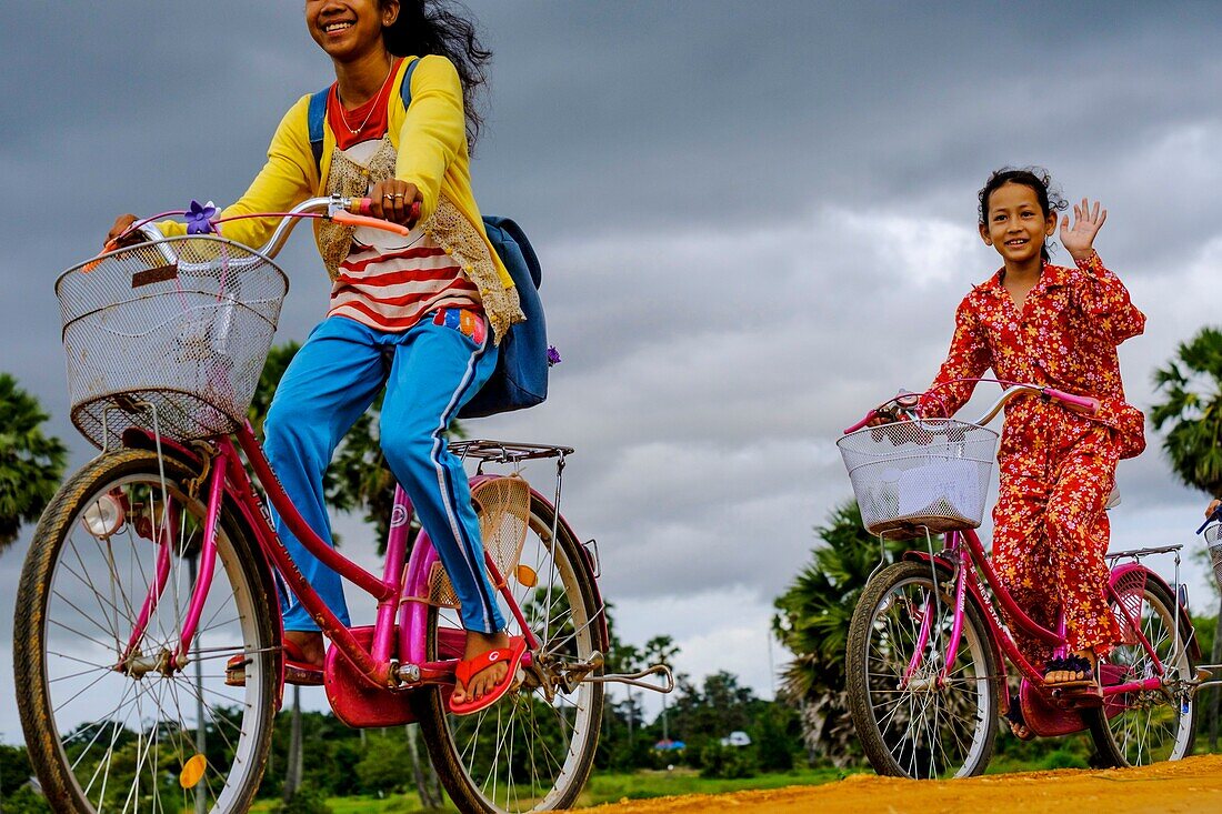 Cambodia, Kompong Chhnang or Kampong Chhnang, monsoon sky, schoolchildren