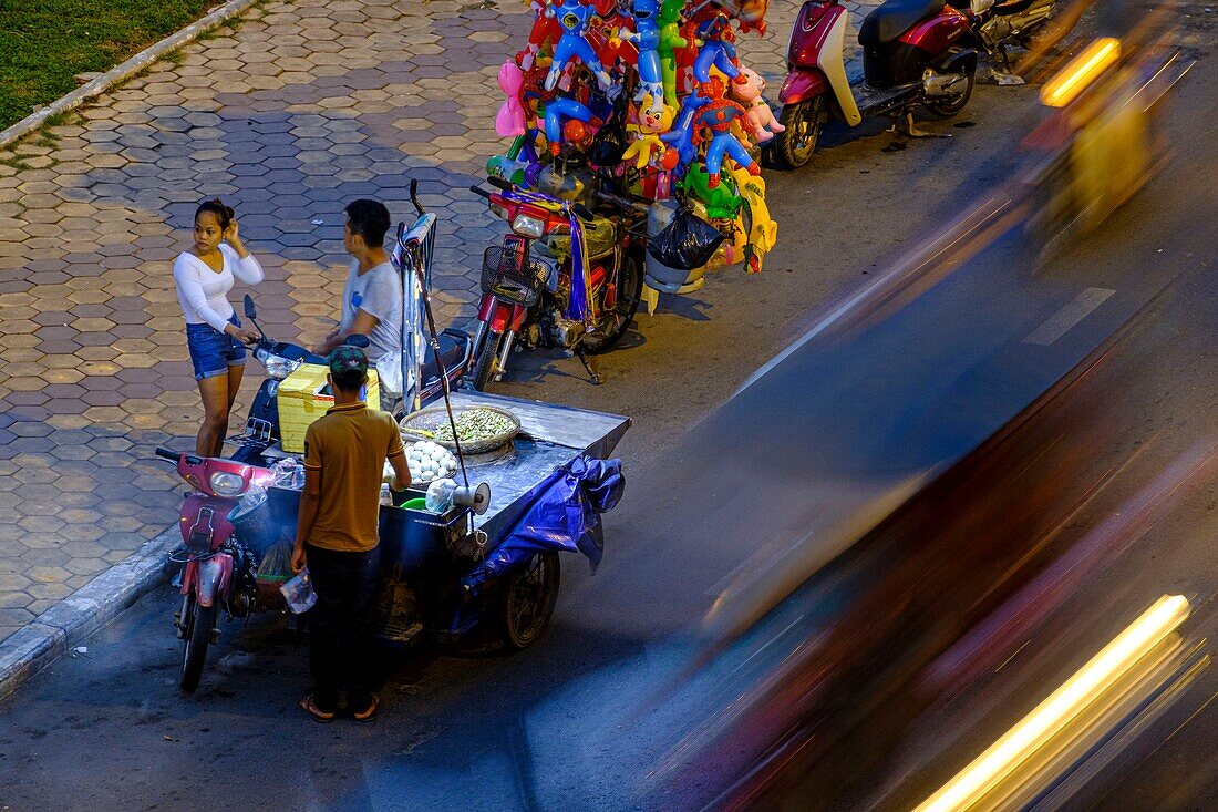 Cambodia, Phnom Penh, Sisowath riverline, Bassac river and walk about in front of Royal Palace