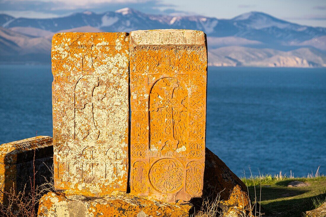 Armenia, Gegharkunik region, Hayravank, the 9th and 10th centuries Hayravank monastery built on a rocky promontory overlooking Sevan Lake, khatchkars (carved memorial steles)