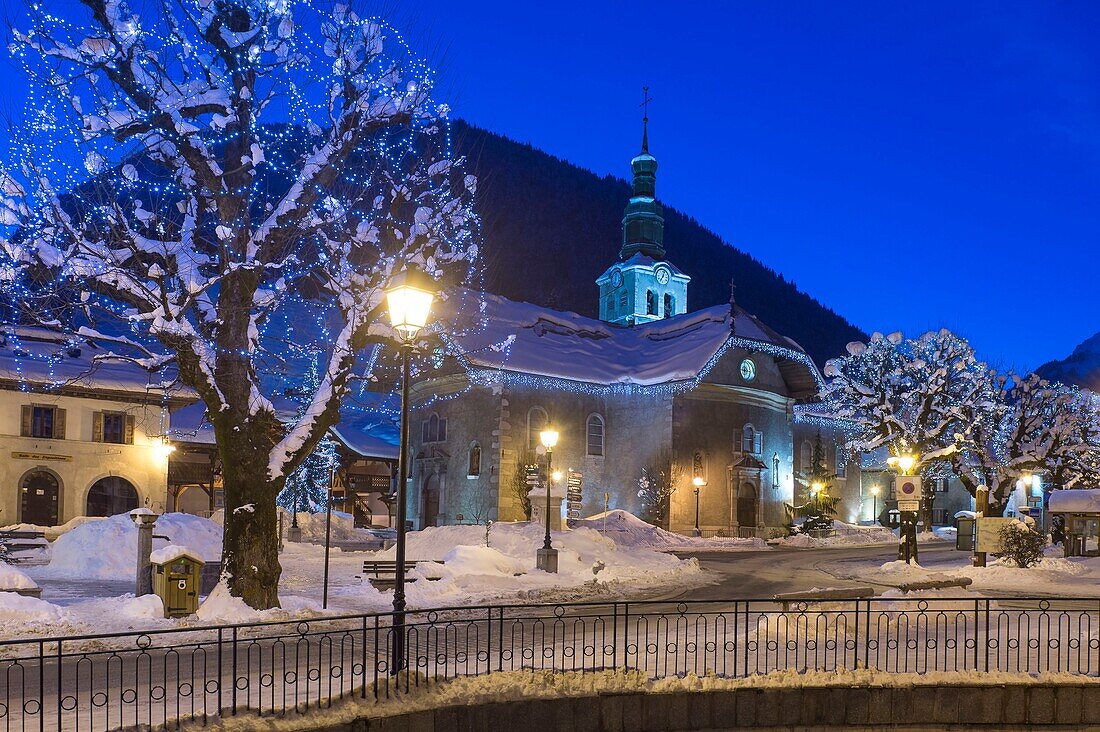 France, Haute Savoie, Massif du Chablais the doors of the sun Morzine the district of the church at dusk