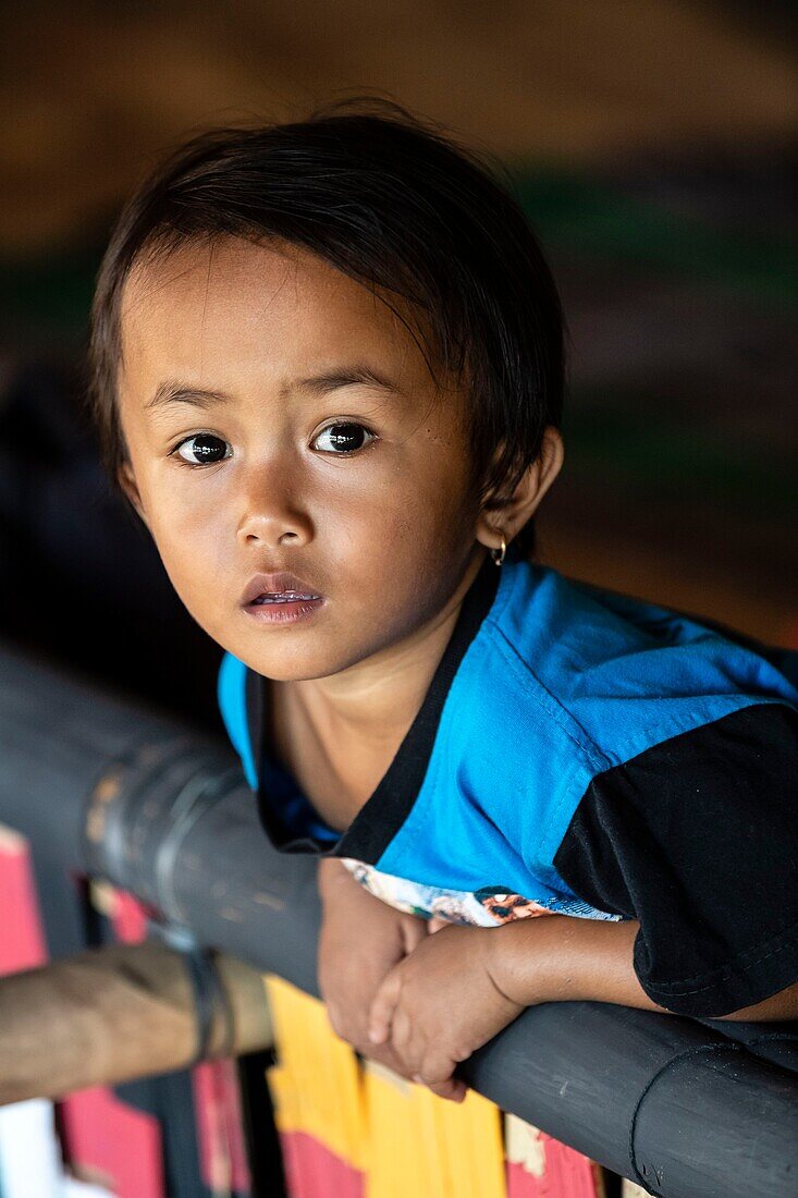 Indonesia, Sulawesi island, Toraja country, Tana Toraja, Tana Toraja, Rantepao, portrait of a child