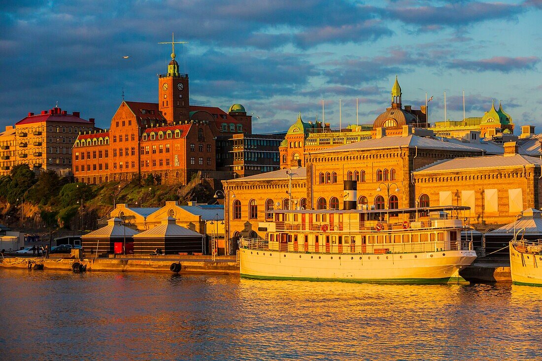 Sweden, Vastra Gotaland, Goteborg (Gothenburg), the roofs of the buildings of the company ASECO on Packhusplatsen and Kvarnberget and his clock