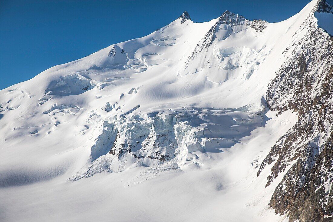 Switzerland, Canton of Valais, the mount Nadelhorn (4327m) and the mount Stecknadelhorn (4241m) (aerial view)