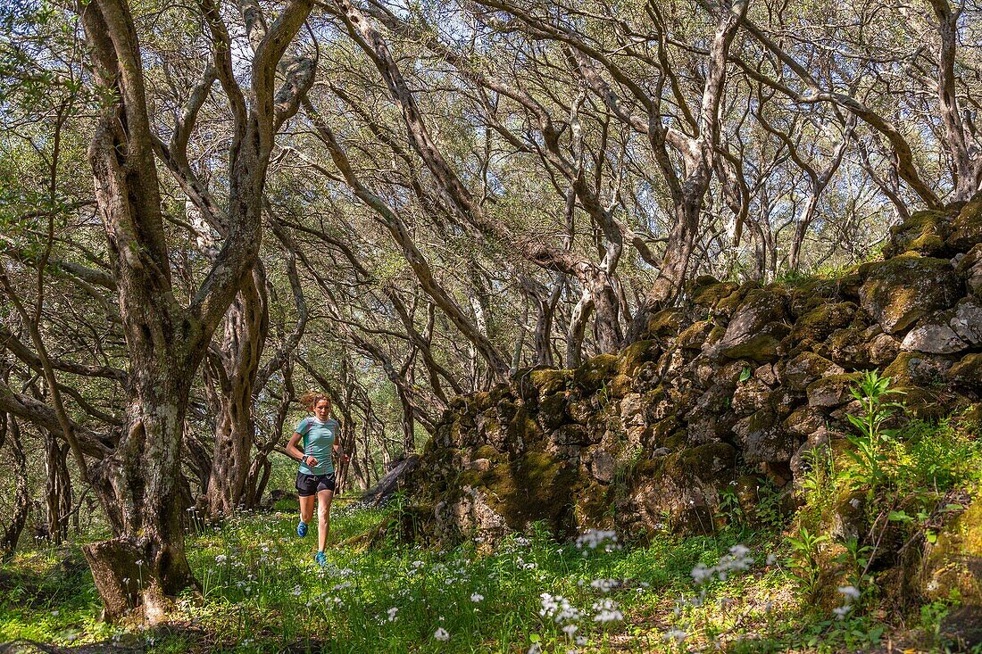 Greece, Ionian Islands, Corfu, woman practicing running