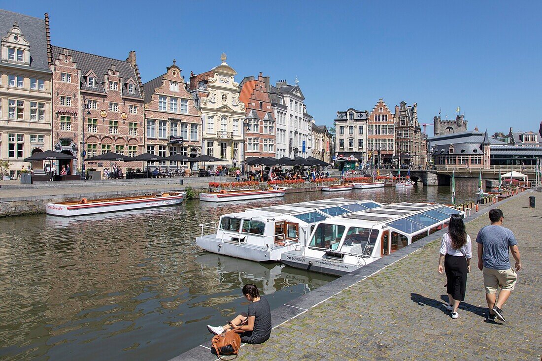 Belgium, East Flanders, Ghent, Korenlei (Quai au Blé), along the river Lys, tourist boats and old houses of baroque and classical style