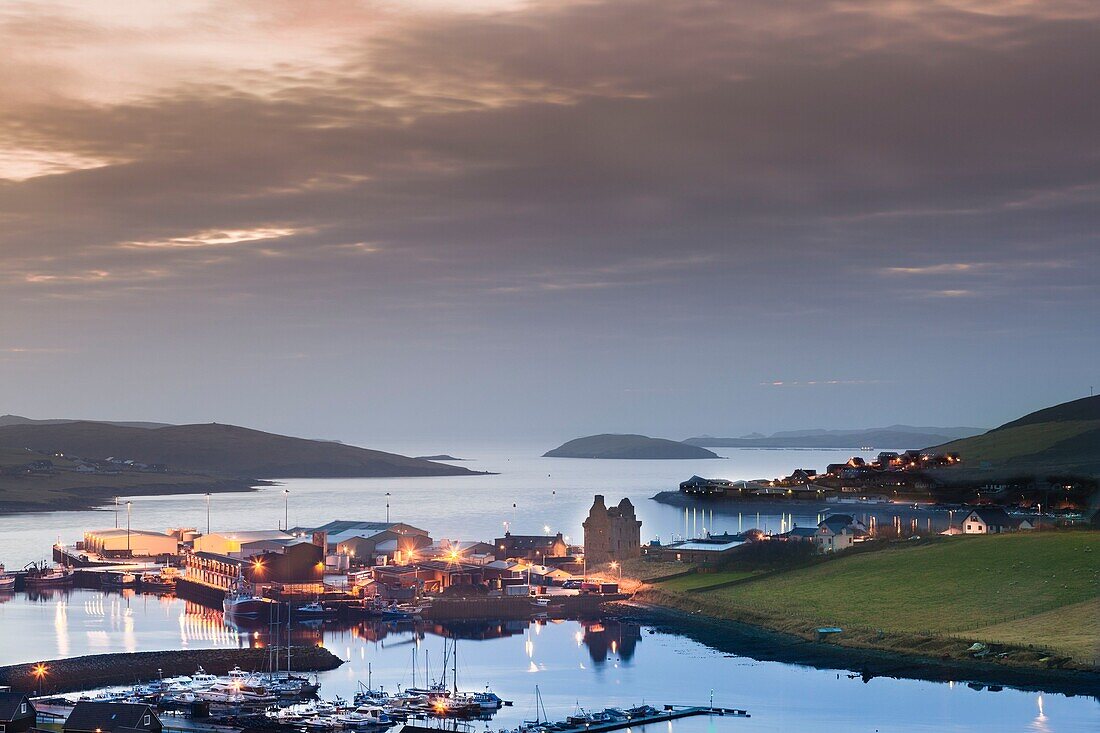 United Kingdom, Scotland, Shetland Islands, Mainland, Scalloway, elevated panoramic view of the harbour at sunset