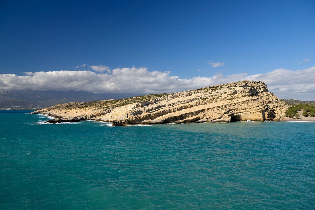 Greece, Crete, Matala, Matala Bay, beach and caves seen from the south cliff