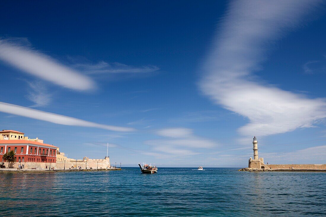 Greece, Crete, Chania, venetian port, lighthouse at the entrance of the harbor