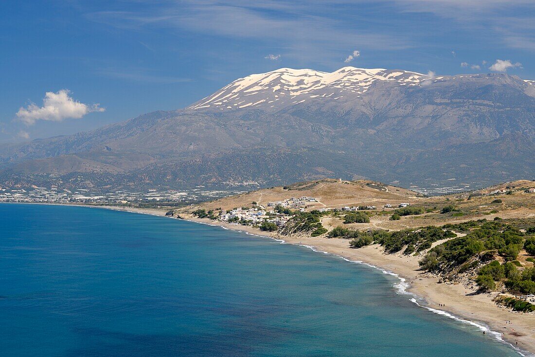 Greece, Crete, Pitsidia, Komos Beach, Komos Beach with Mount Ida (or Psiloritis Mountain) in background 2,456 meters