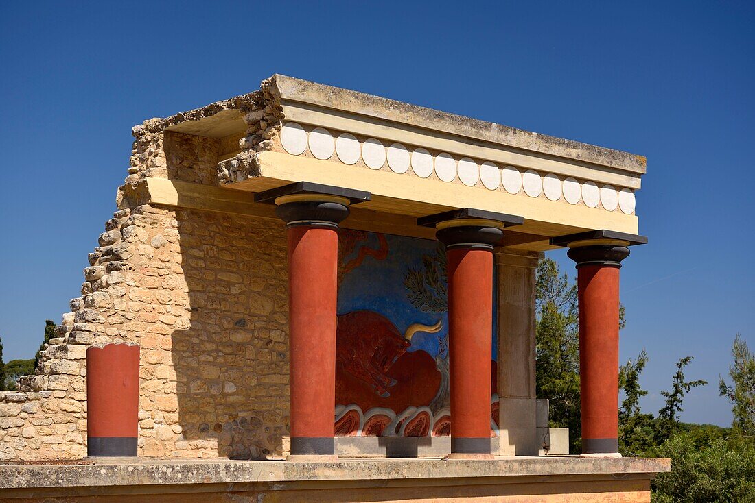 Greece, Crete, Knossos, archeological site, Palace of King Minos, the North entrance columns with bull capture fresco