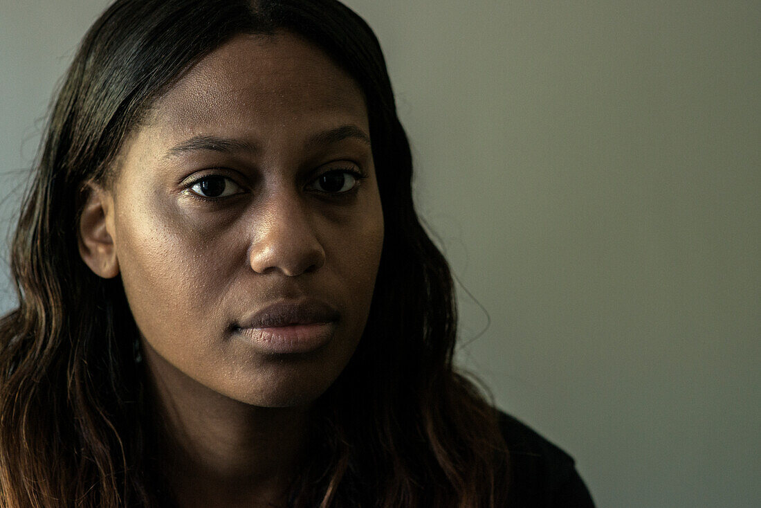 Studio Portrait of a Young Adult, Colored Woman born in the Caribbean. Tilburg, Netherlands.