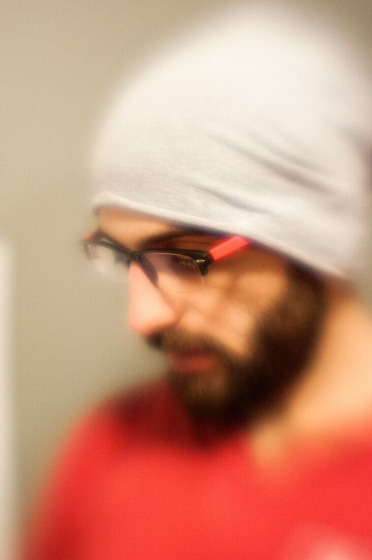 Tilburg, Netherlands. En profile portrait of a Syrian male, made with Lensbaby. MR=YES