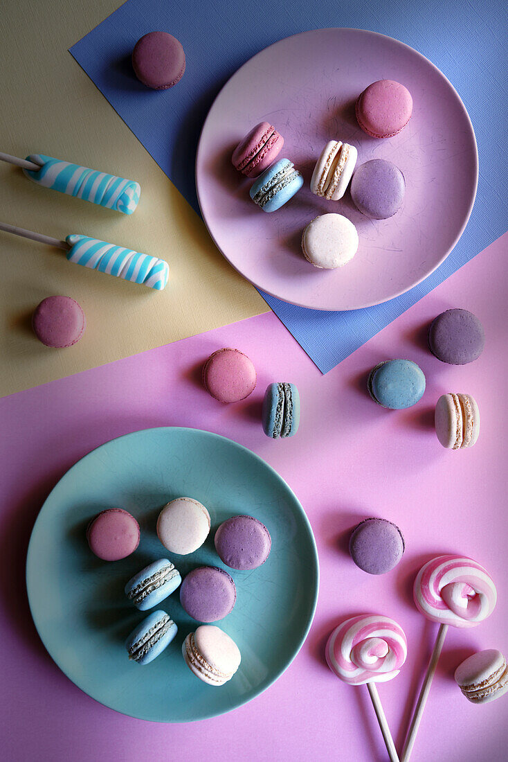 Colourful French macarons. Aesthetic flat lay with retro colour blocking.