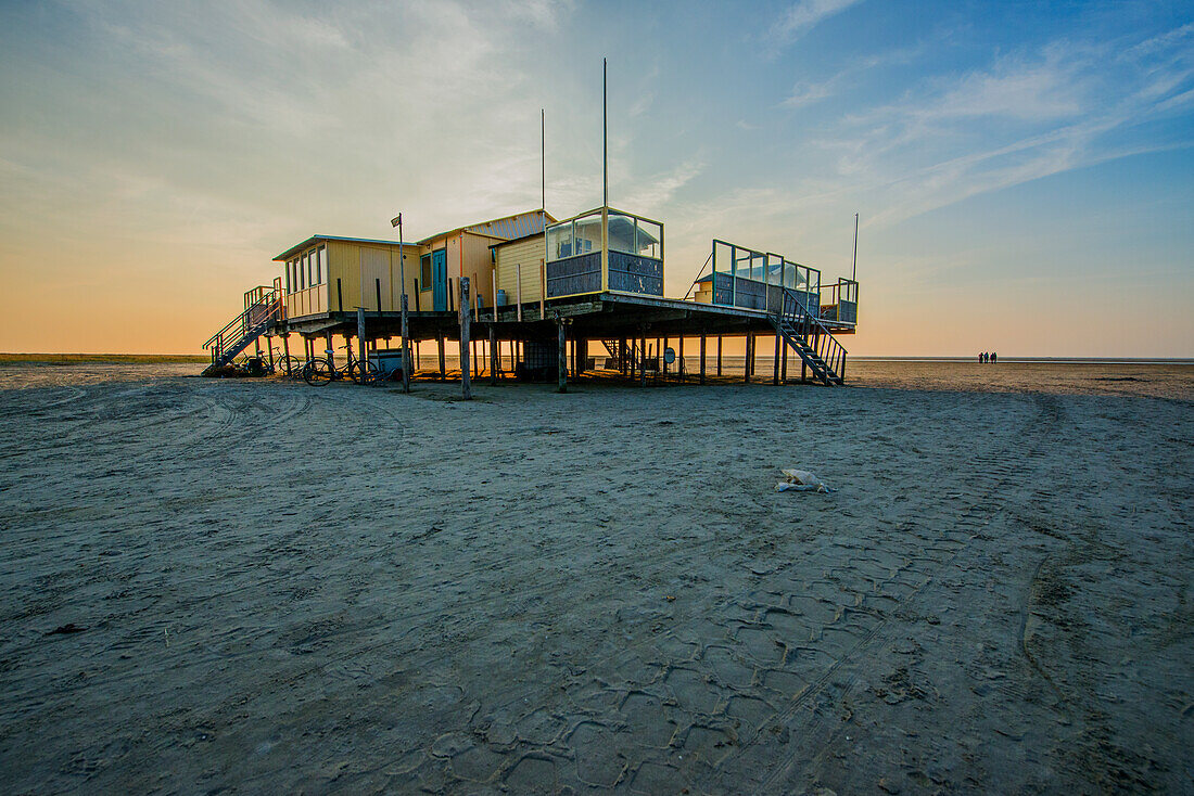 A Wooden, Elevated Beach House on North Beach / Noorderstrand on Schiermonnikoog Island, is used as Home Base of Kiters, Surfers and various other Watersports Enthousiasts. Wadden Sea, Groningen, Netherlands.