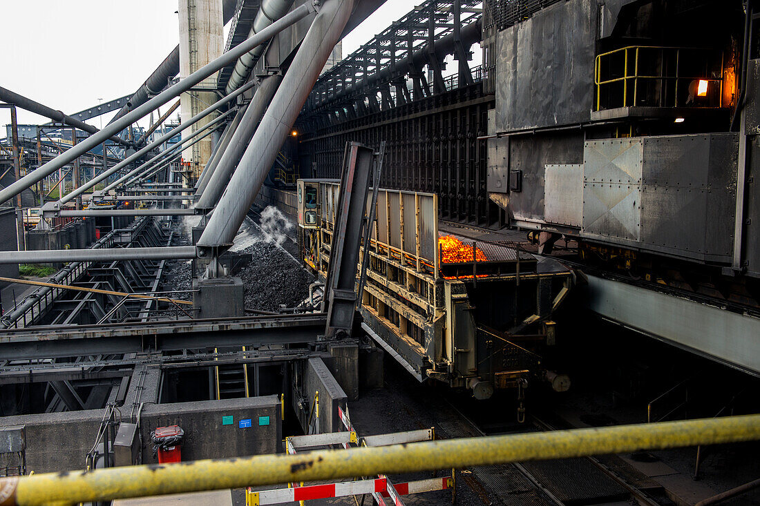 Huge, heavy steel production plant and industry terrain, producing various kinds of steel inside an CO2 Emitting and Exhausting Factory. IJmuiden, Netherlands.