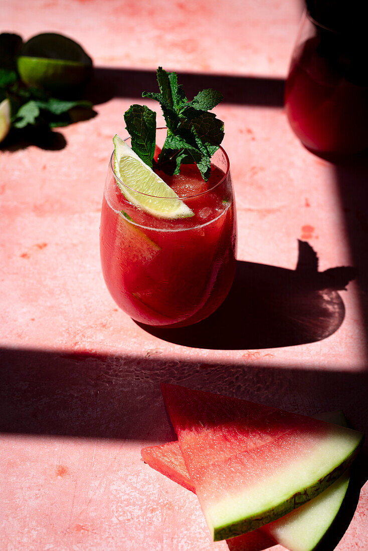 Watermelon and lime drink in harsh light