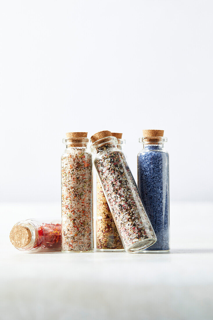 Various jars of special salts for the kitchen