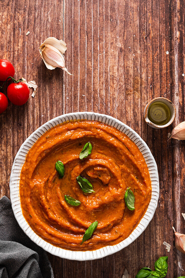 Bowl of fresh tomato sauce and basil