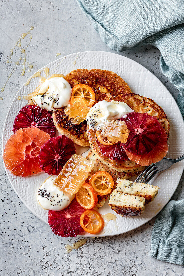 Citrus almond flour poppy seed pancakes with honey