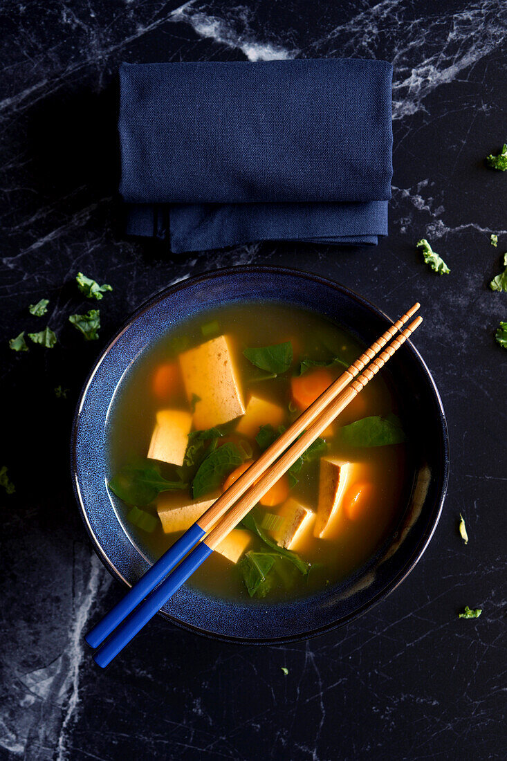 Rustic miso soup in the Okinawa style, close-up.