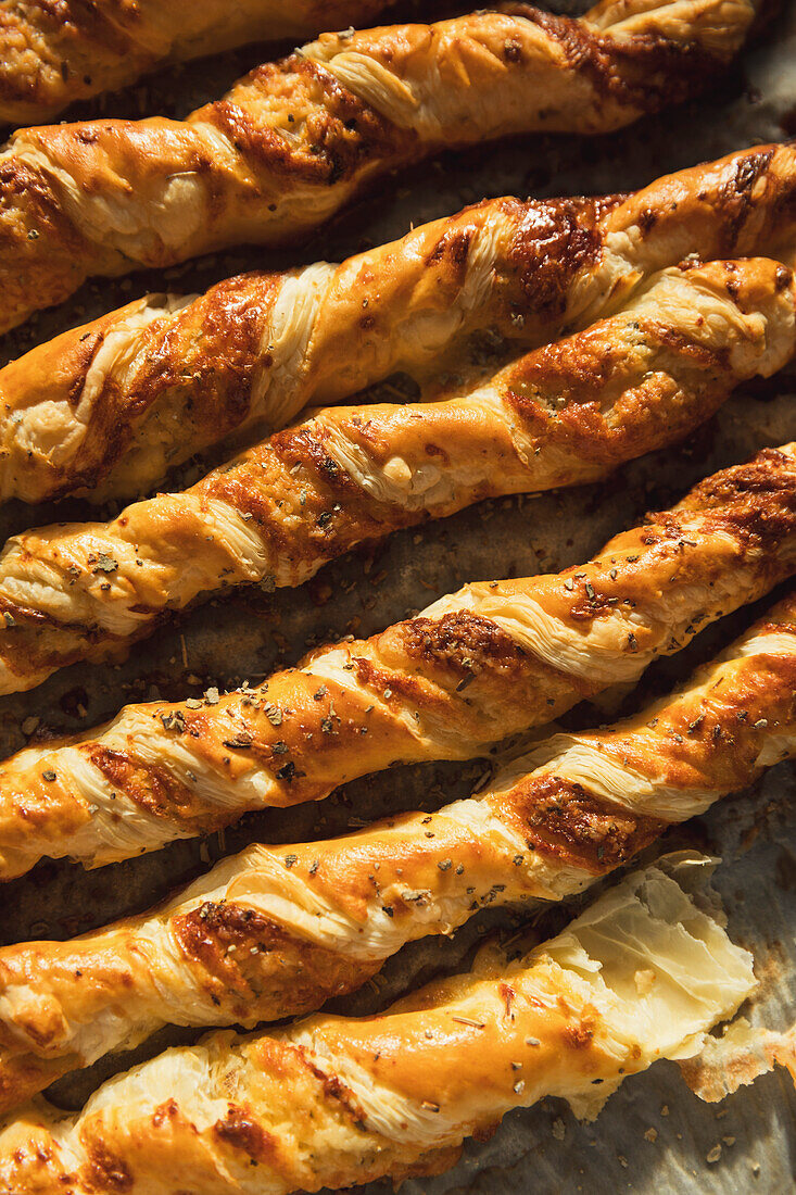 Homemade Cheese Straws on greaseproof paper