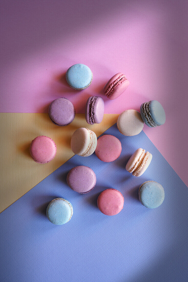 Colourful French macarons. Retro colour-blocking aesthetic flat lay.