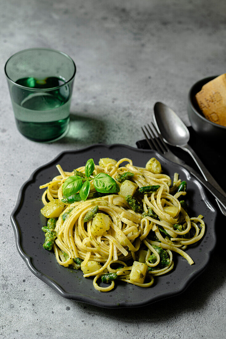 trenette pasta served with pesto and basil