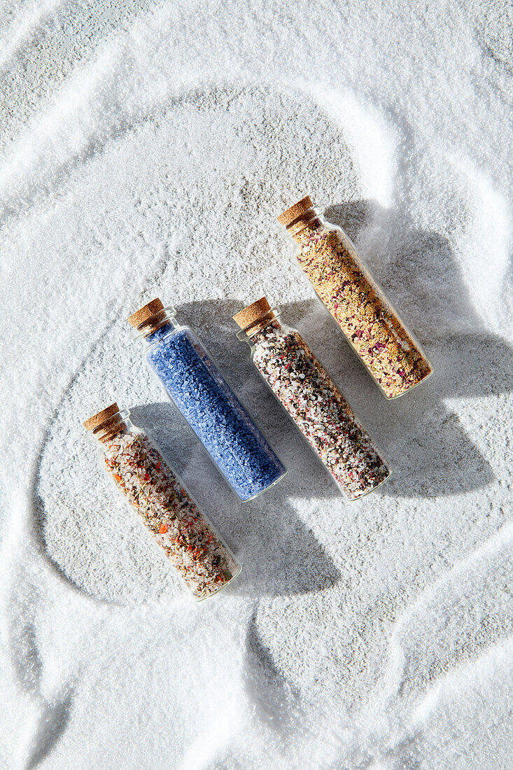 Various salt jars containing specialist salts for cooking