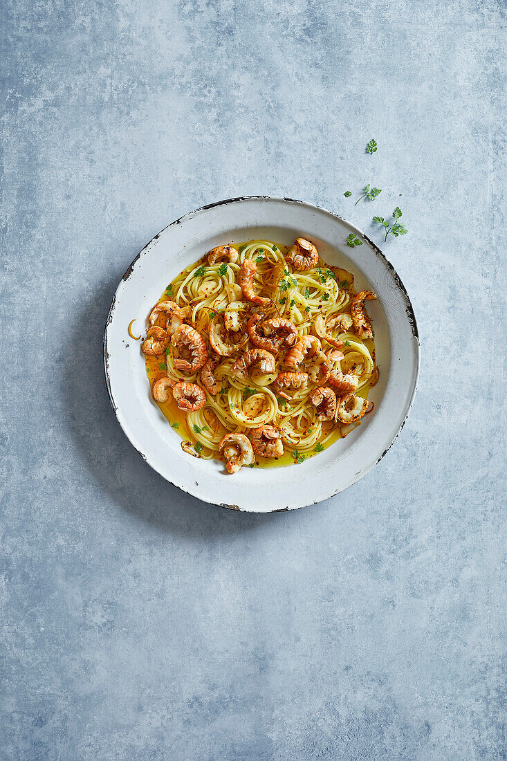 Langoustines with spaghetti, garlic and olive oil.