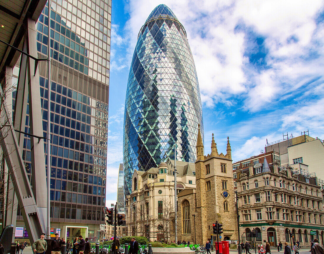 The 16th century St. Andrew Undershaft Church, St. Mary Axe, with the Gherkin, built in 2003, behind, City of London, London, England, United Kingdom, Europe