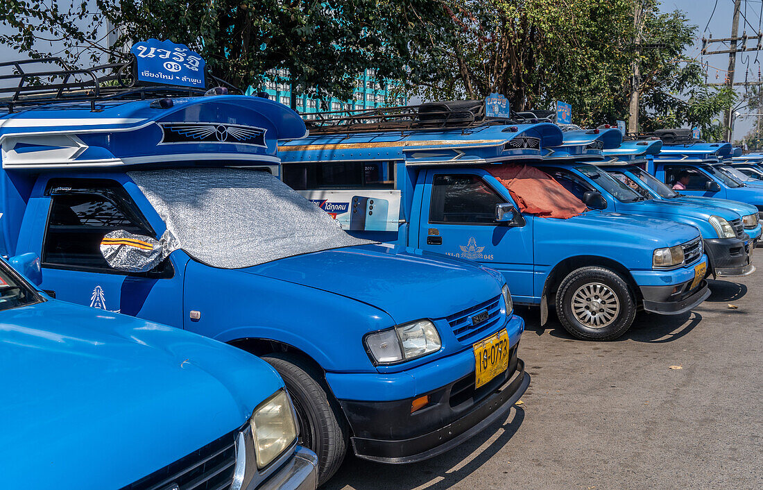 Collective minibuses parked in in Chiang Mai, Thailand, Southeast Asia, Asia