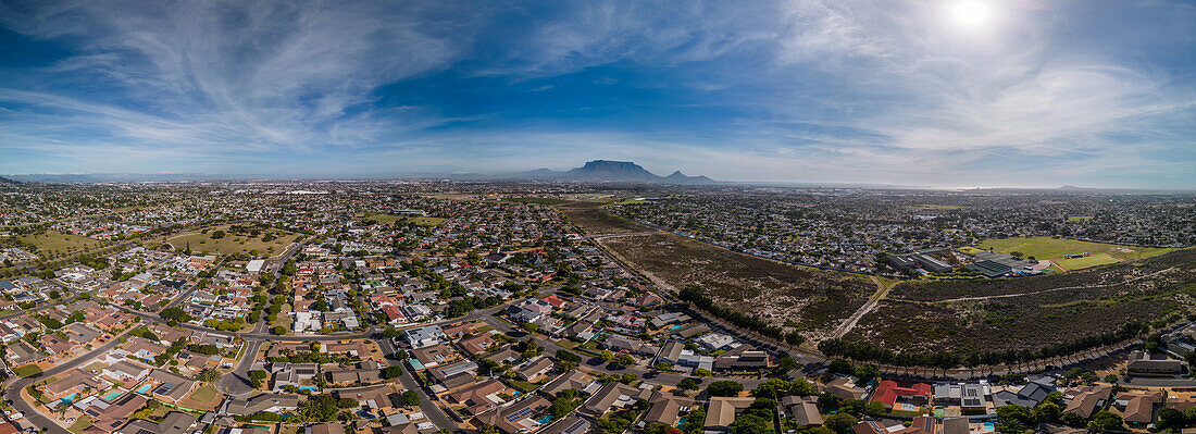 Aerial drone panoramic view of Northern residential suburbs in Cape Town, looking towards the south and Table Mountain, Cape Town, Western Cape, South Africa, Africa