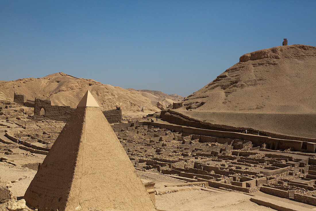 Tomb Entrance in foreground, Ruins of Workmen's Village in the background, Deir el-Medina, Ancient Thebes, UNESCO World Heritage Site, Luxor, Egypt, North Africa, Africa