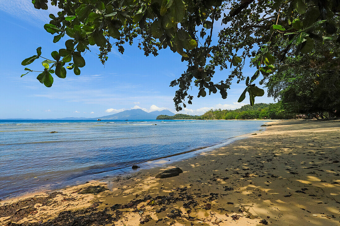 View from Pulisan beach to Paal Beach and headland, with Tangkoko mountain and reserve beyond, Pulisan, Minahasa Highlands, North Sulawesi, Indonesia, Southeast Asia, Asia