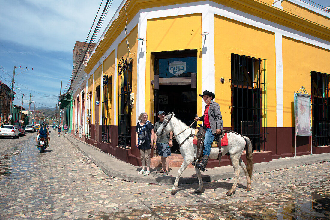 Horseman in the back streets, Trinidad, Sancti Spiritus Province, Cuba, West Indies, Caribbean, Central America