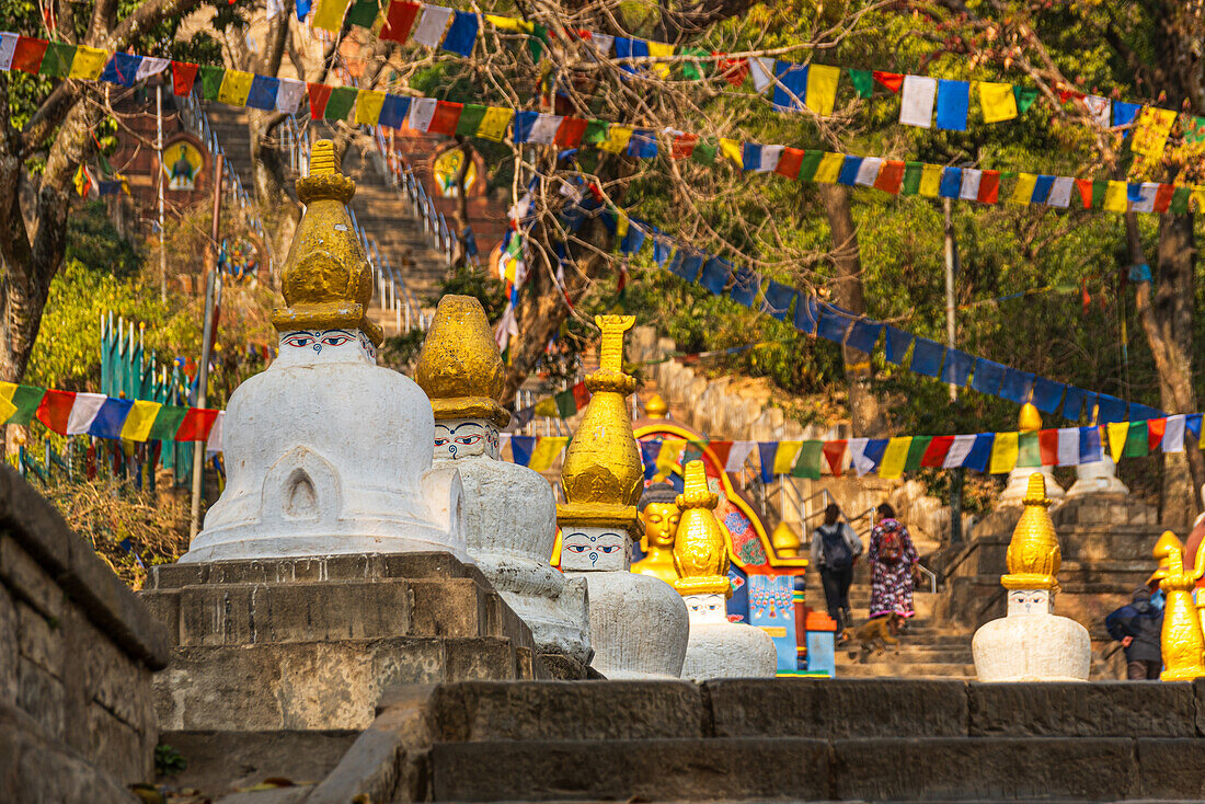 Small white stupas with face and golden top, Bhagwan Pau Swayambhu Stupa, Kathmandu, Nepal, Asia