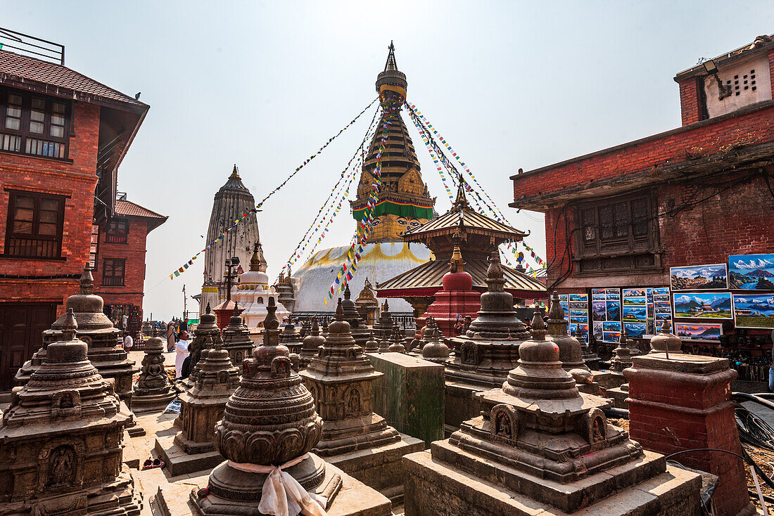 Blue sky and prayer flags at large Swayambhu (Swayanbhunath) Stupa, UNESCO World Heritage Site, Kathmandu, Nepal, Asia