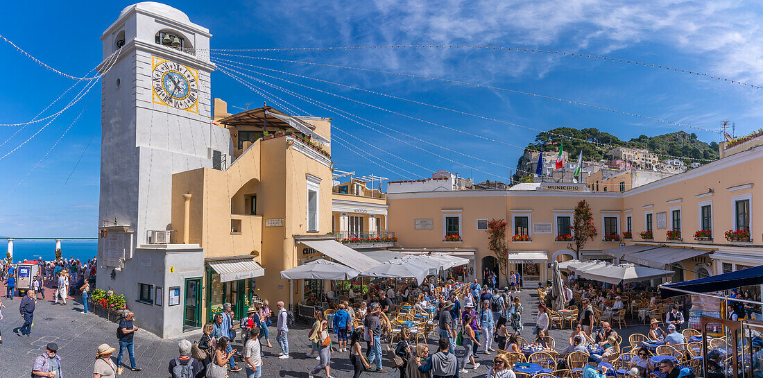 View of Clock Tower and cafes in Piazza Umberto I (La Piazzetta), Capri Town, Isle of Capri, Bay of Naples, Campania, Italy, Mediterranean, Europe