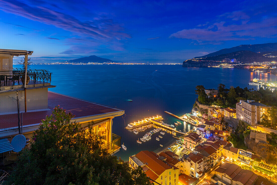 Panoramic view of Sorrento, Mount Vesuvius and Bay of Naples at night, Sorrento, Campania, Italy, Mediterranean, Europe