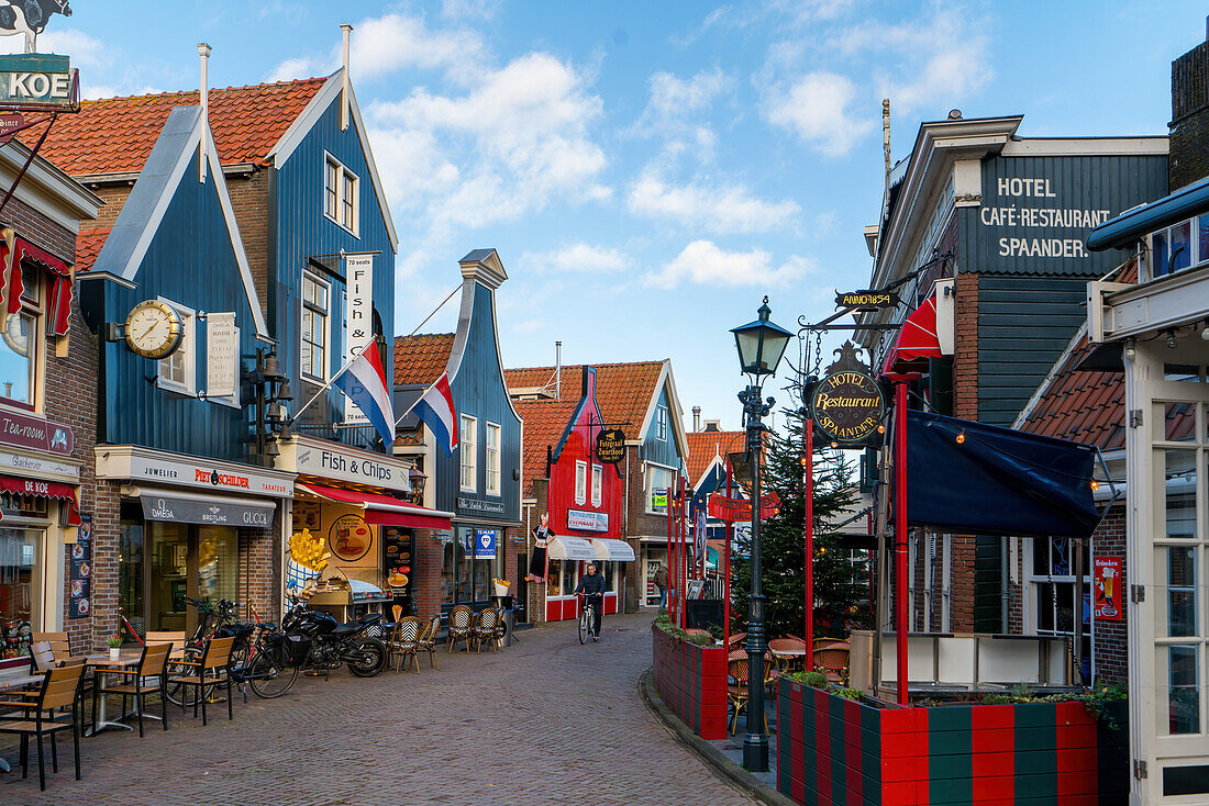 Volendam main street with traditional Dutch houses and shops, Volendam, North Holland, The Netherlands, Europe