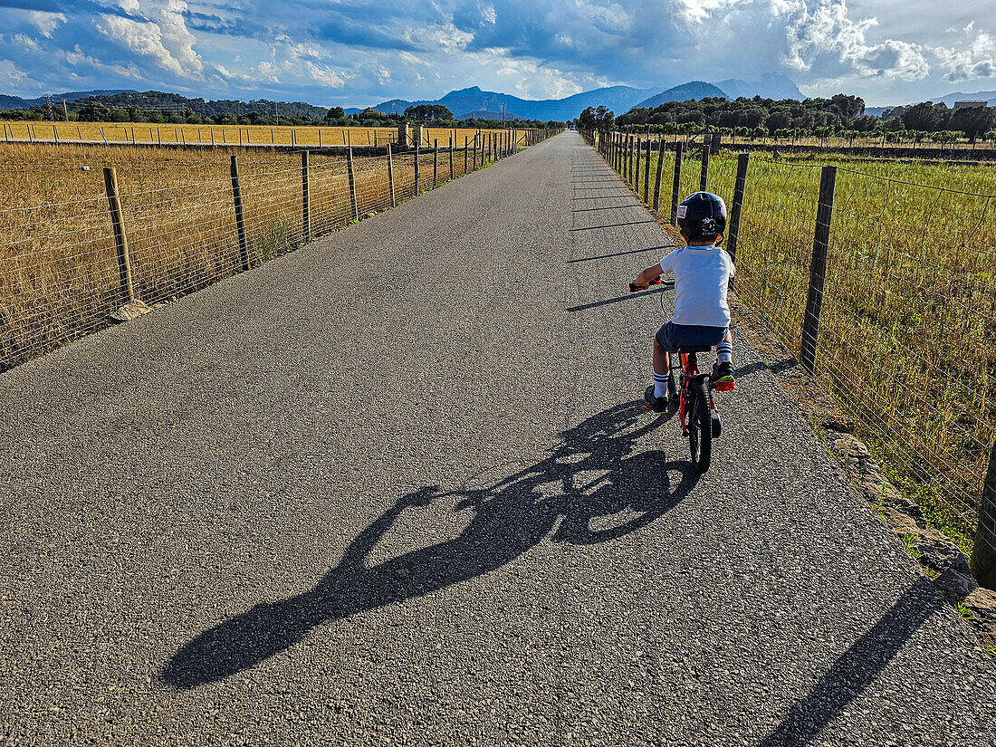 Kids cycling, Mallorca, Balearic islands, Spain, Mediterranean, Europe