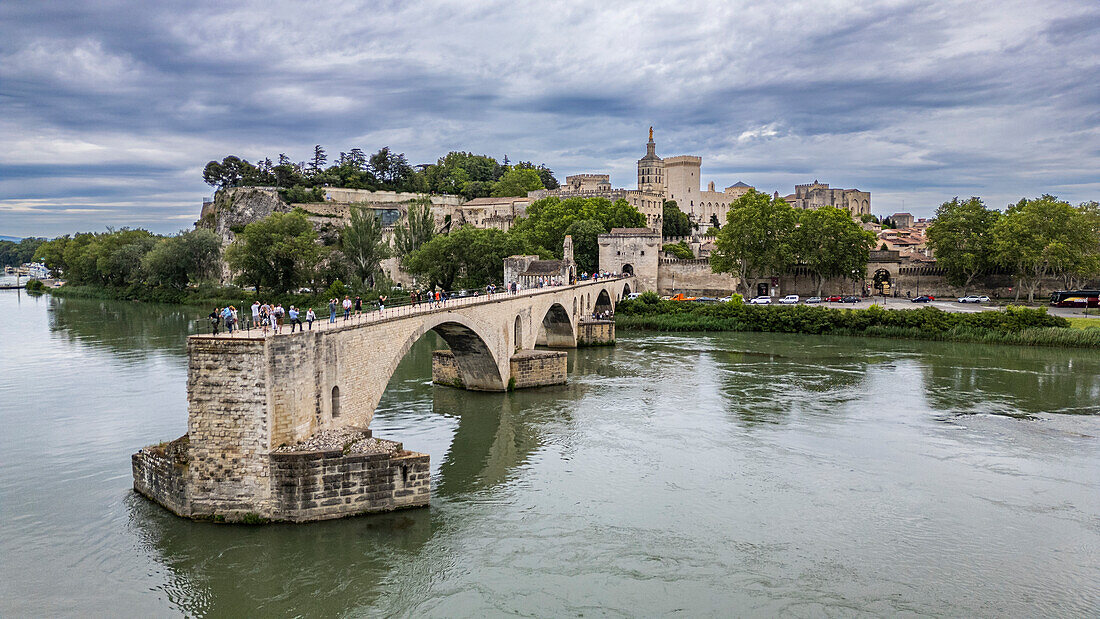 Aerial of the historic Bridge of Saint Benezet (Pont d'Avignon) with the historic city, Avignon, UNESCO World Heritage Site, Vaucluse, Provence-Alpes-Cote d'Azur, France, Europe