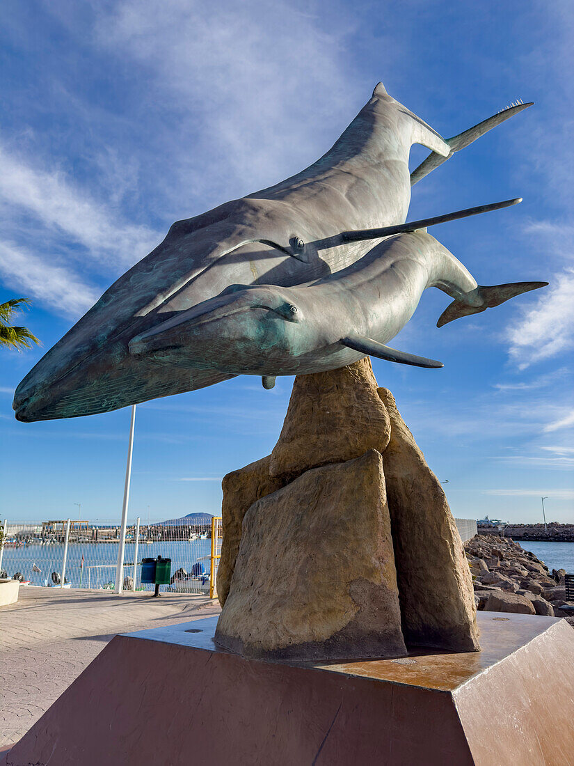 A statue of a whale mother and calf in the inner harbor in Loreto, Baja California Sur, Sea of Cortez, Mexico, North America